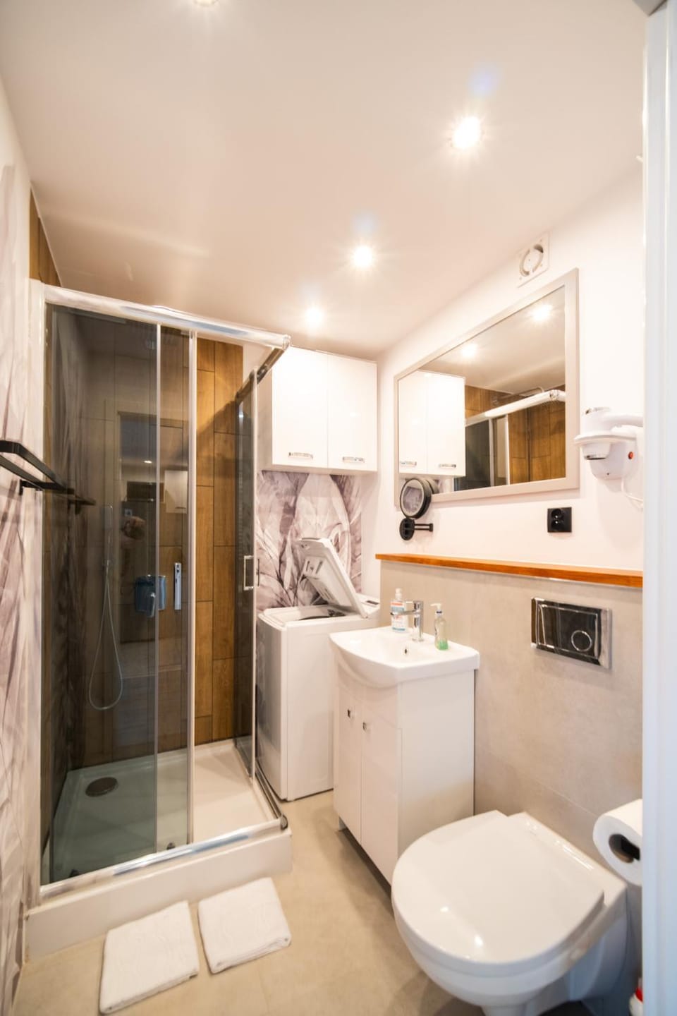 Shower, Toilet, Bathroom, towels, washing machine, dryer