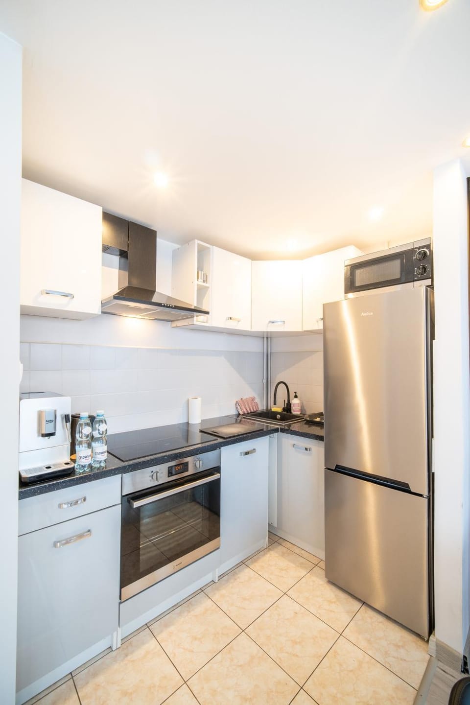 Kitchen or kitchenette, dishwasher, stove, toaster