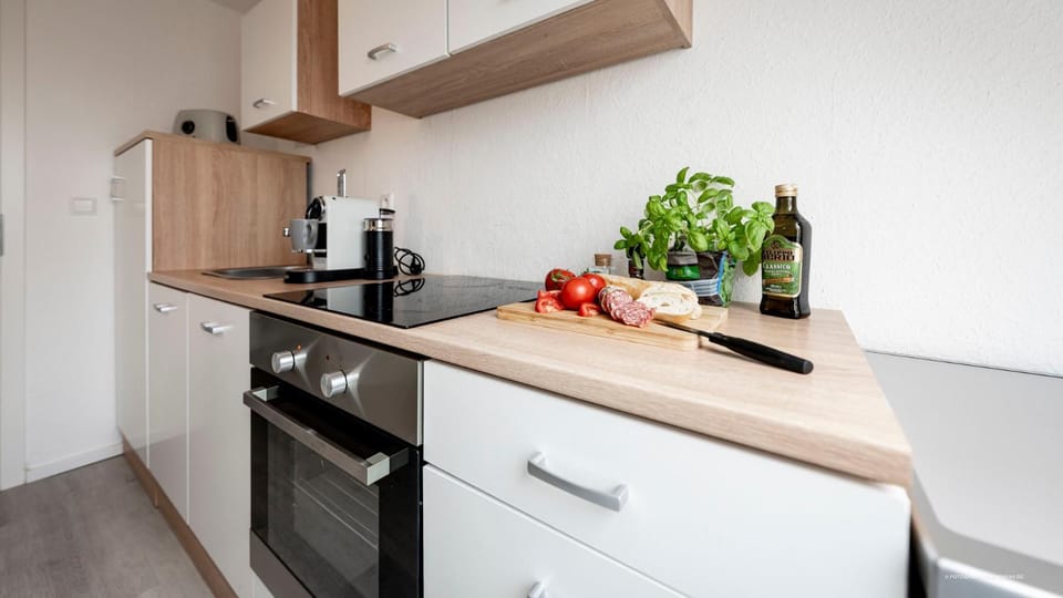 Kitchen or kitchenette, oven, stove