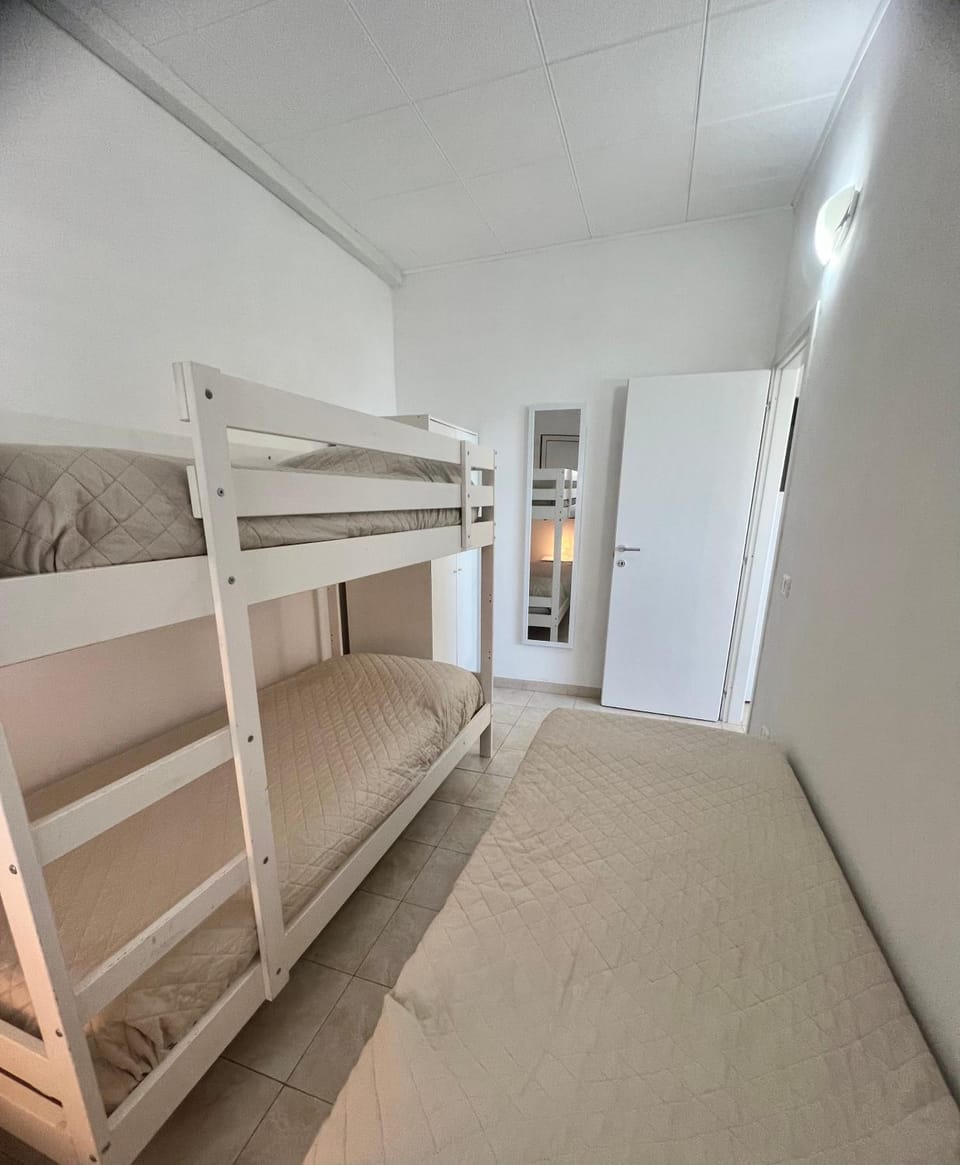 Photo of the whole room, bunk bed, wardrobe