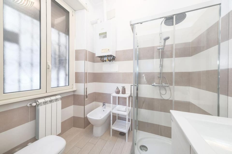 Shower, Toilet, Bathroom, bidet, hair dryier, towels