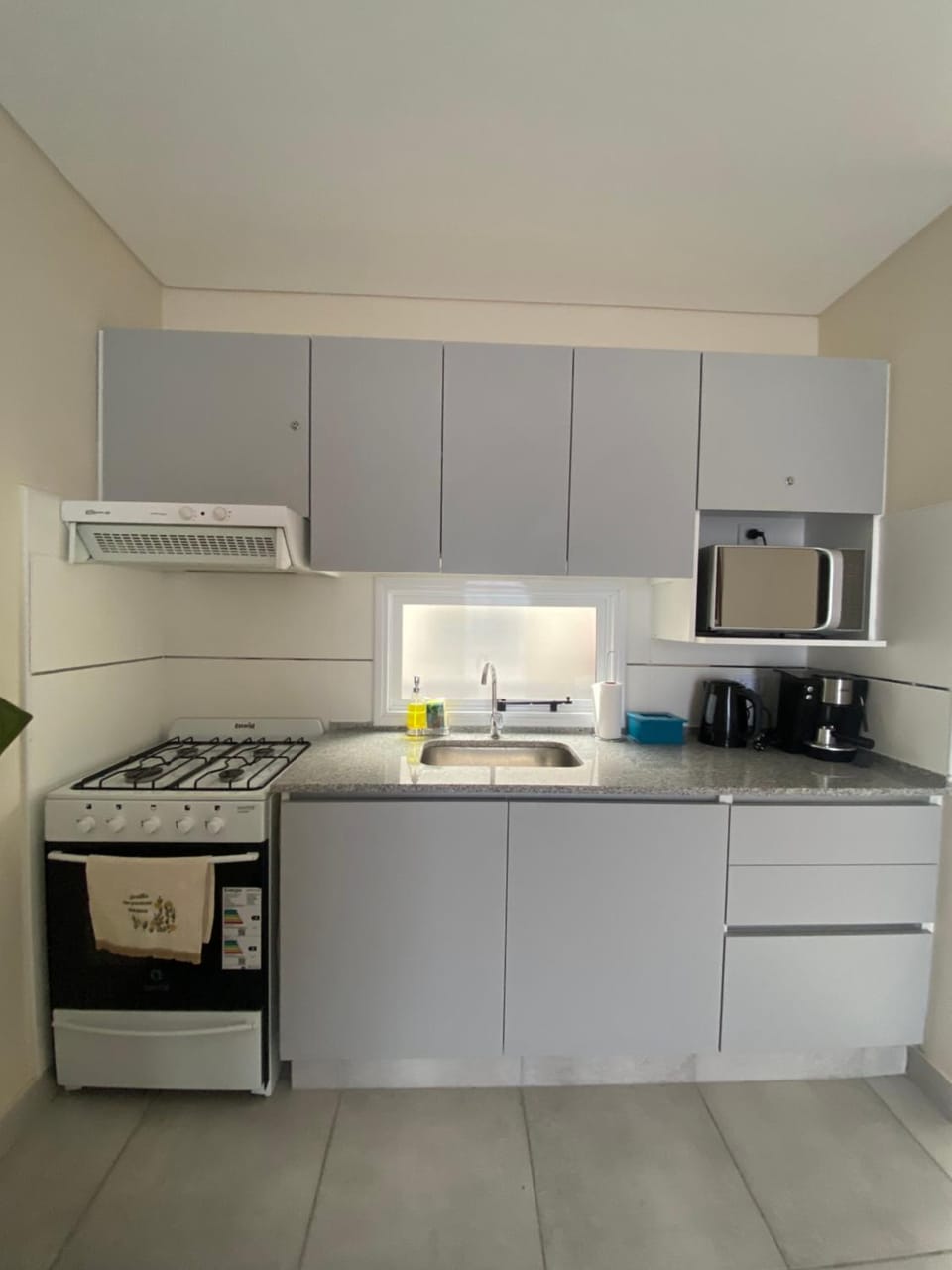 Kitchen or kitchenette, oven