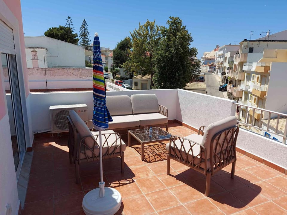 Property building, Patio, Balcony/Terrace, Seating area