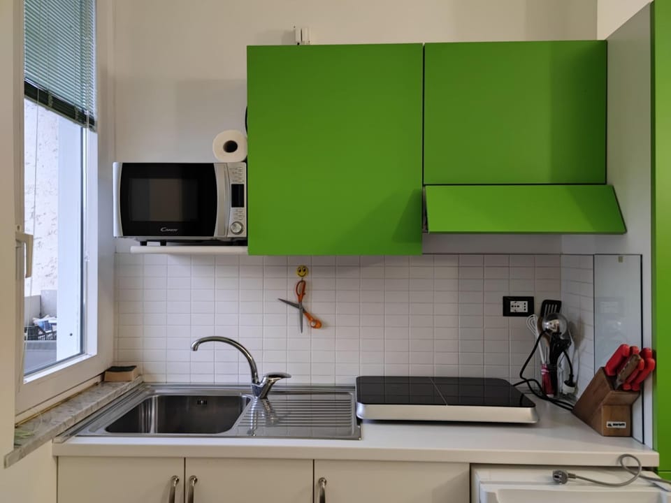 Kitchen or kitchenette, stove