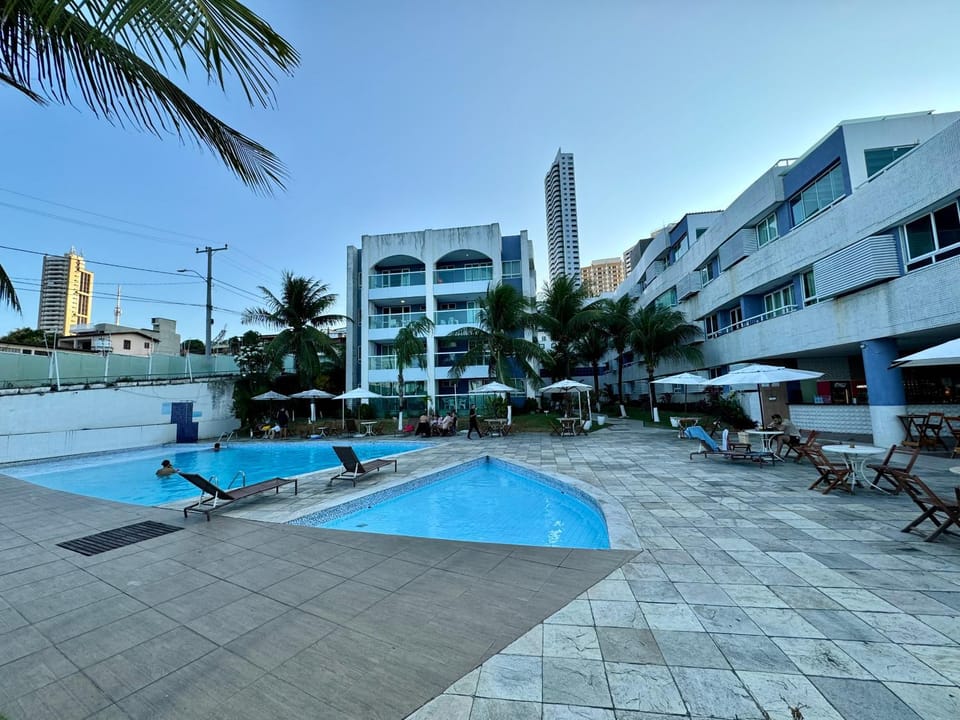Property building, Day, Pool view, Swimming pool, sunbed