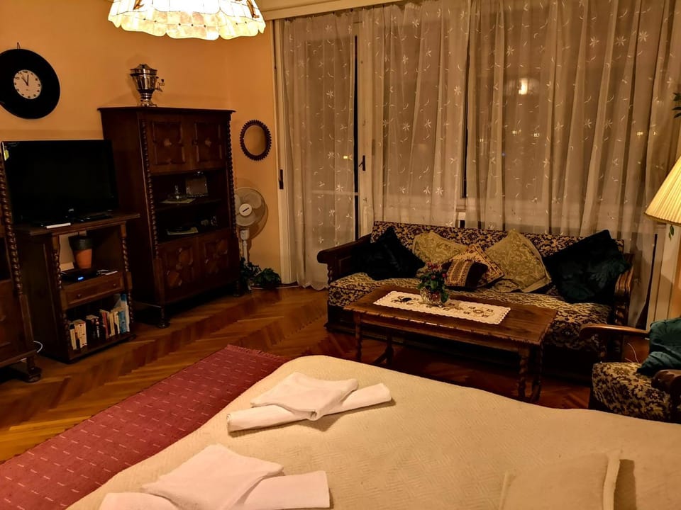 Bed, Library, Living room, Seating area, Bedroom