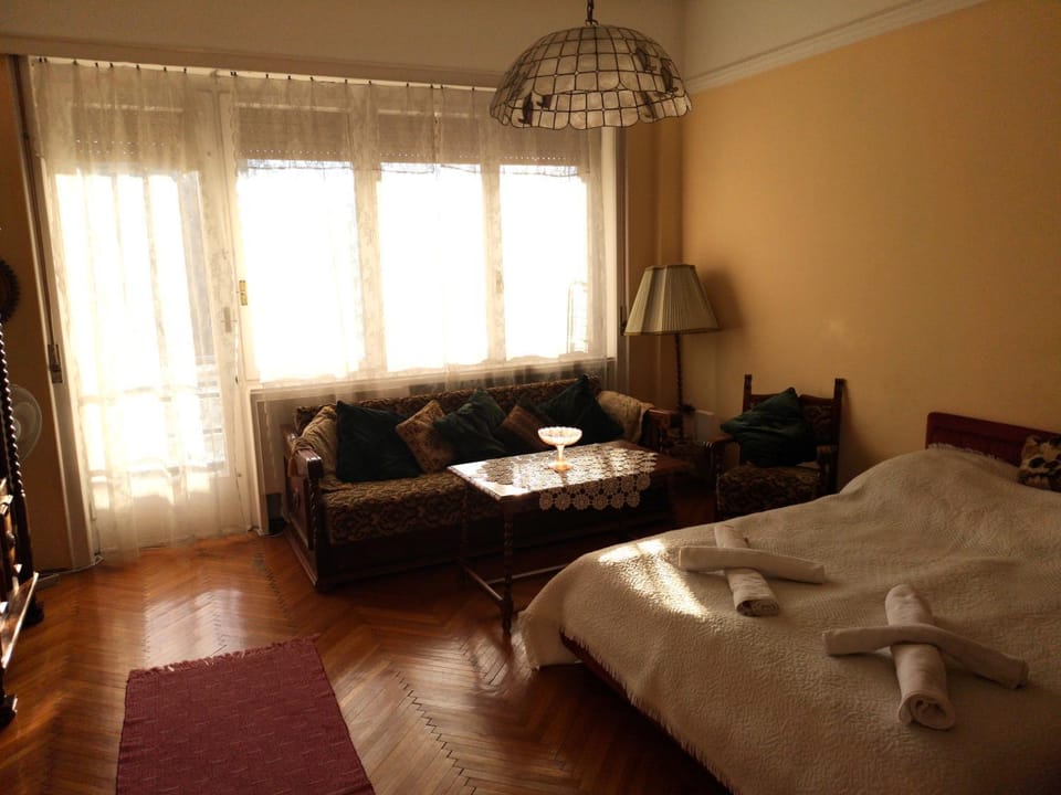 Bed, Living room, Seating area, Bedroom