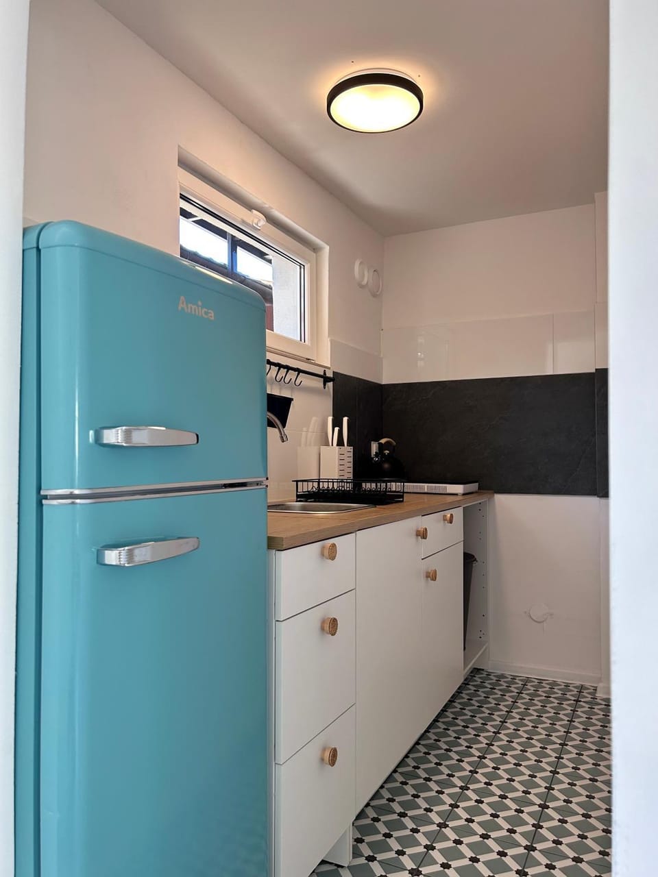 Kitchen or kitchenette, oven, stove