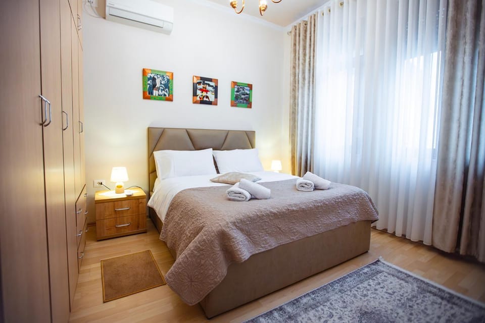 Bed, Photo of the whole room, Bedroom, towels, air conditioner