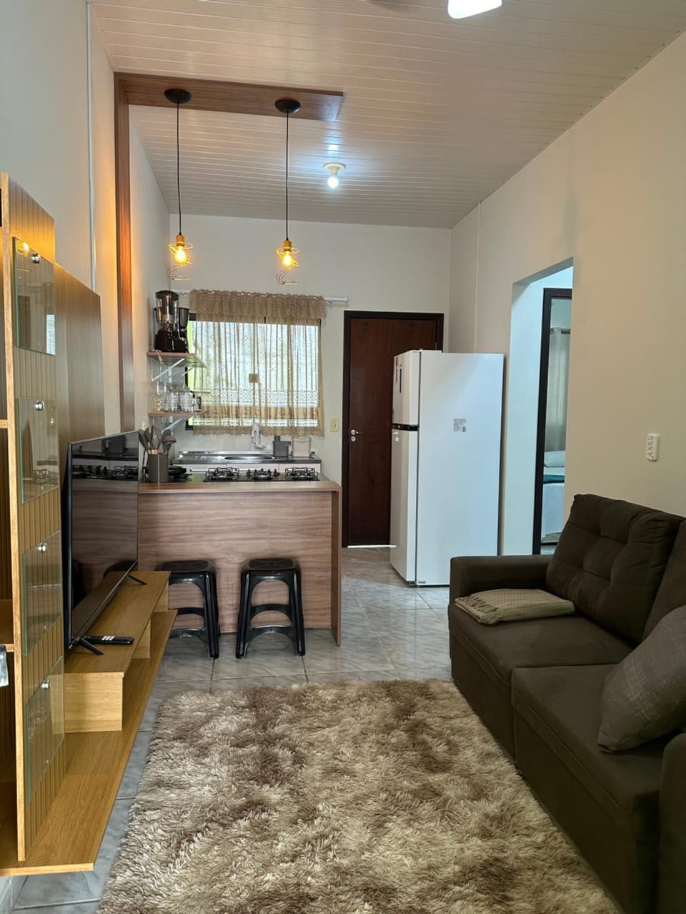 Kitchen or kitchenette, Living room, minibar, stove