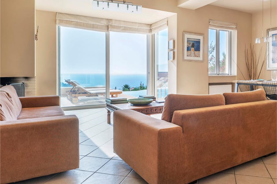 View (from property/room), Living room, Seating area, Garden view, Pool view, Pool view, Sea view, Sea view