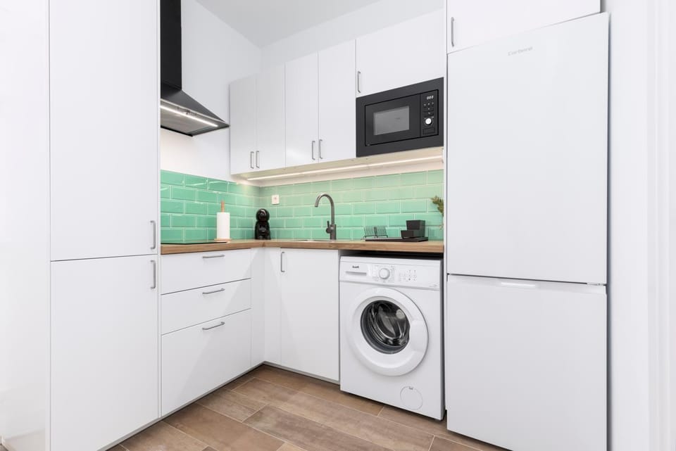 Kitchen or kitchenette, washing machine