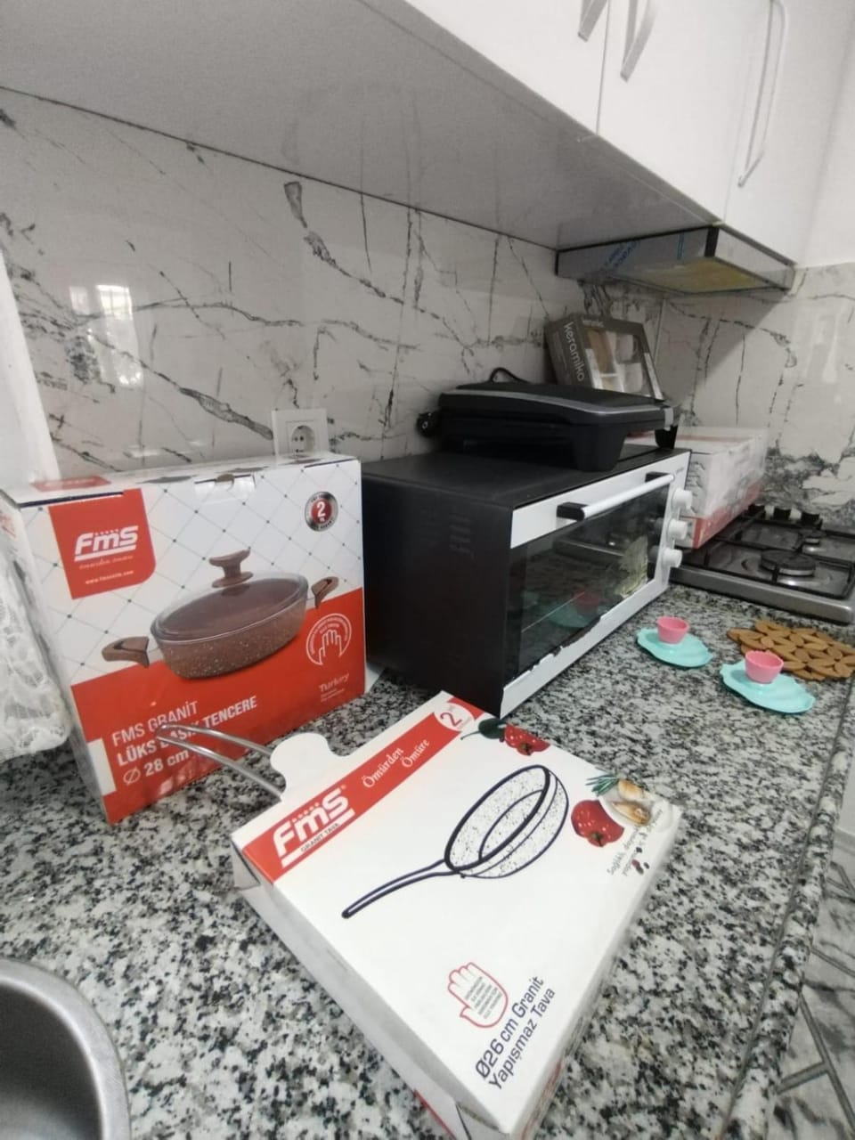 Kitchen or kitchenette, stove