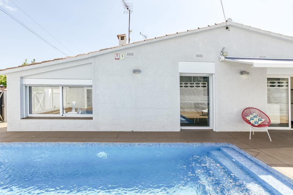 Property building, Living room, Swimming pool