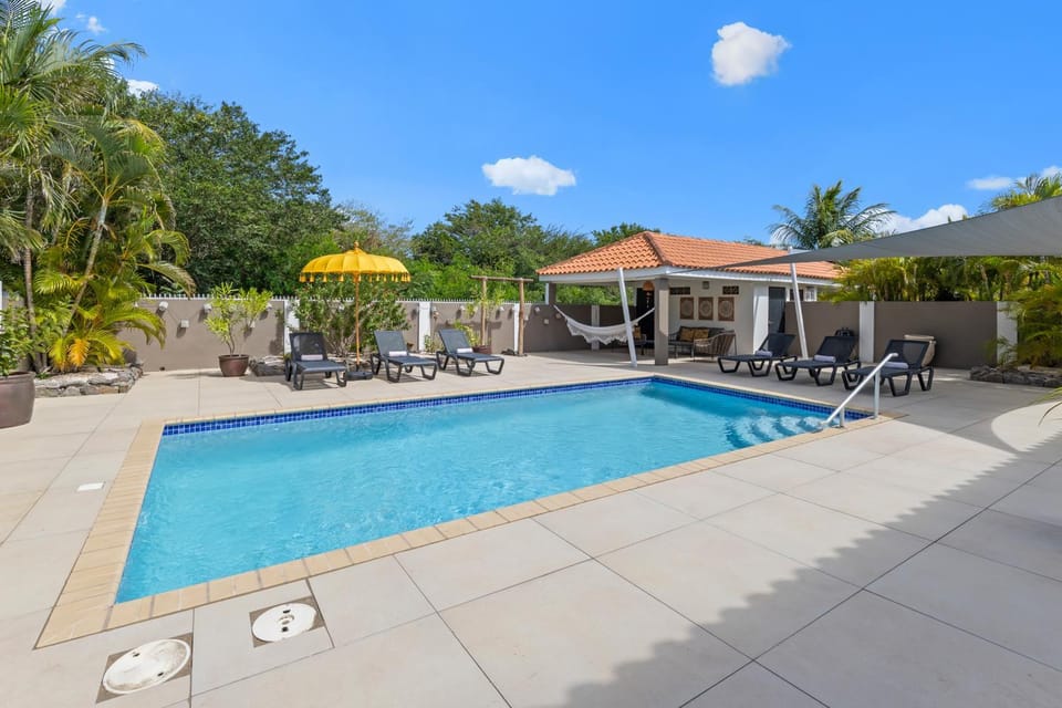 Property building, Patio, Day, Natural landscape, Garden, Garden view, Pool view, Swimming pool, sunbed