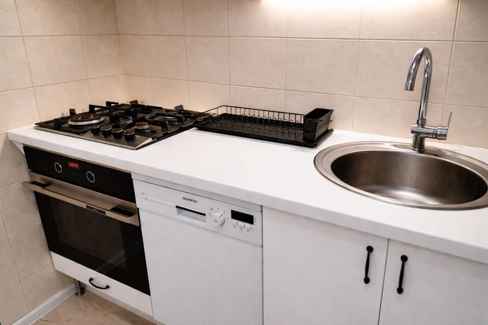 Kitchen or kitchenette, oven, stove