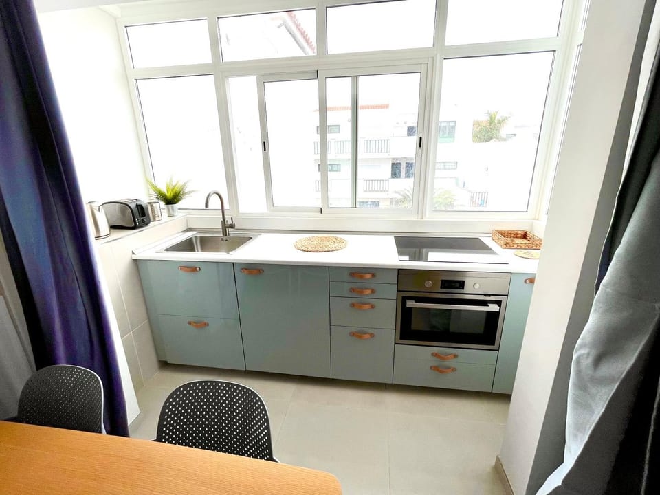 Kitchen or kitchenette, oven, stove