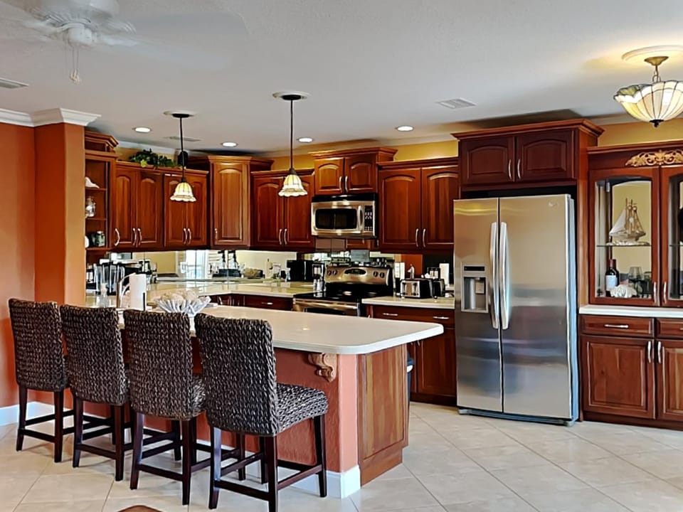 Kitchen or kitchenette, Seating area, furniture, microwave, oven, stove, kitchen