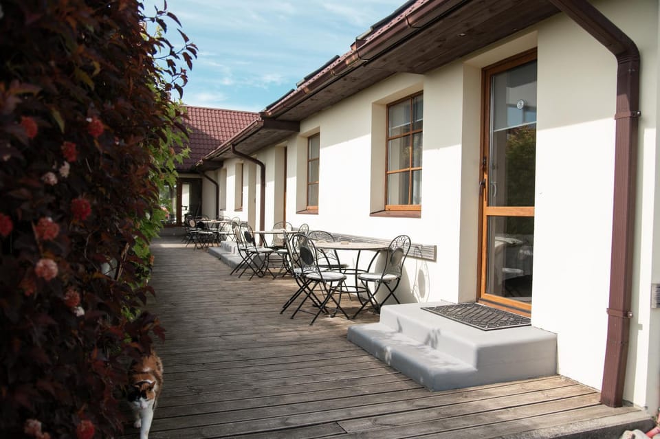 Property building, Patio, Day, View (from property/room), Seating area