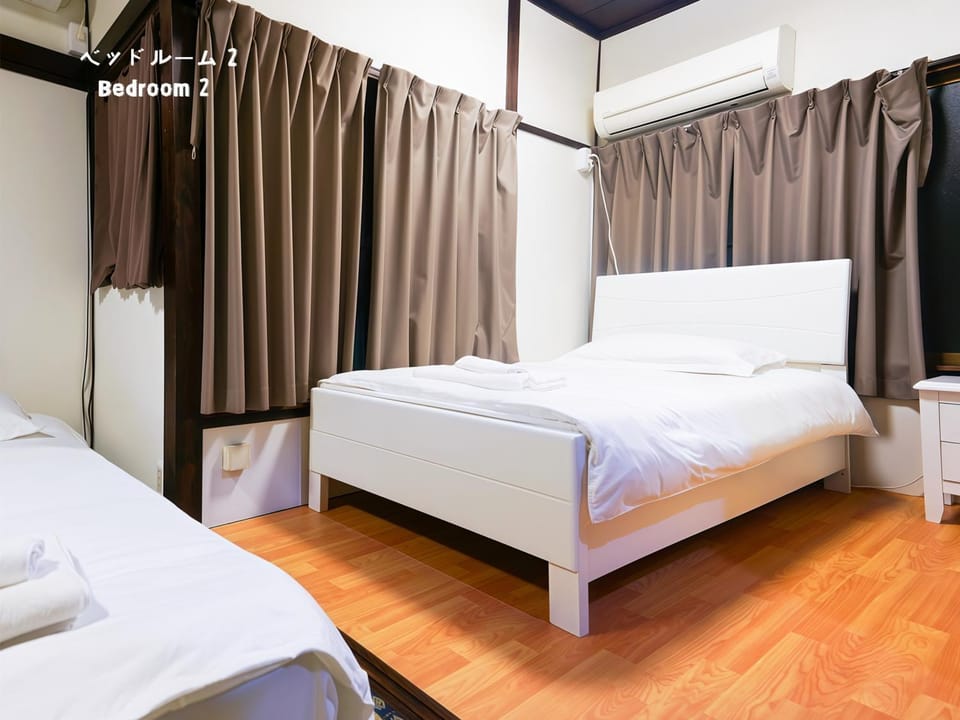 Bed, Photo of the whole room, Bedroom, towels, air conditioner