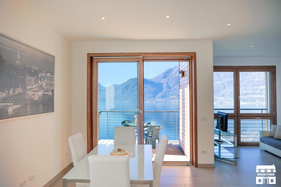Natural landscape, Living room, Seating area, Dining area, Lake view, Mountain view