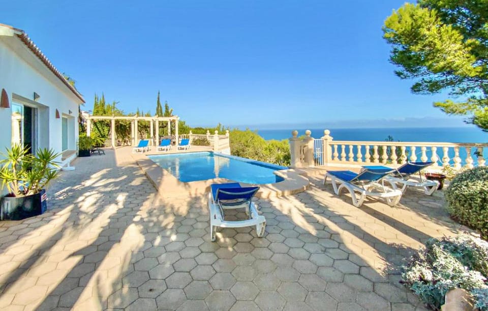 Property building, Patio, Day, View (from property/room), Balcony/Terrace, Pool view, Sea view, Swimming pool, sunbed