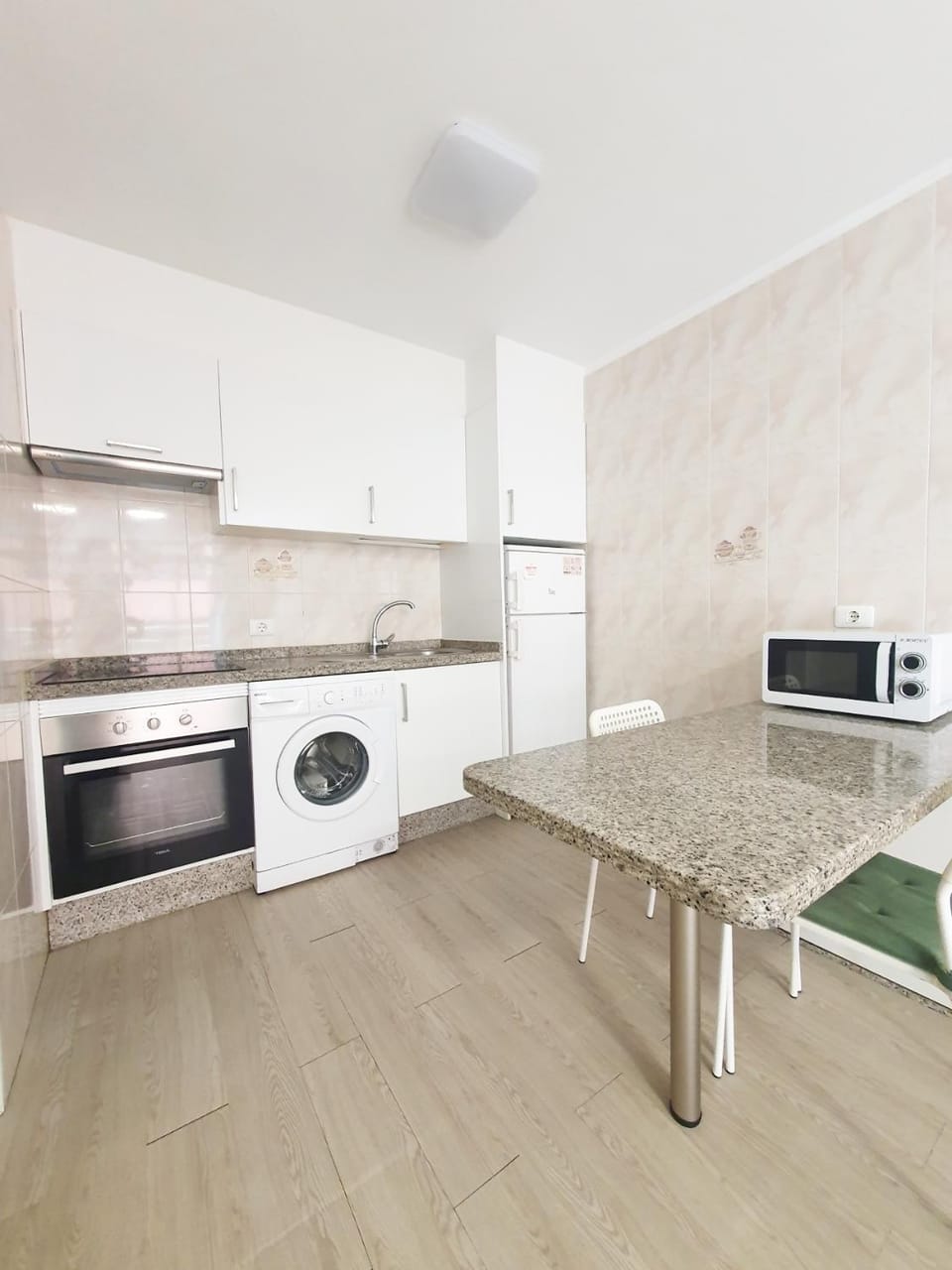 Kitchen or kitchenette, microwave, oven