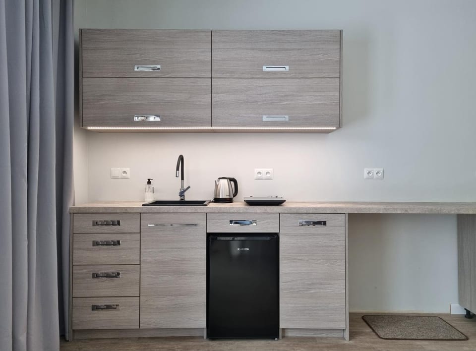 Kitchen or kitchenette, stove