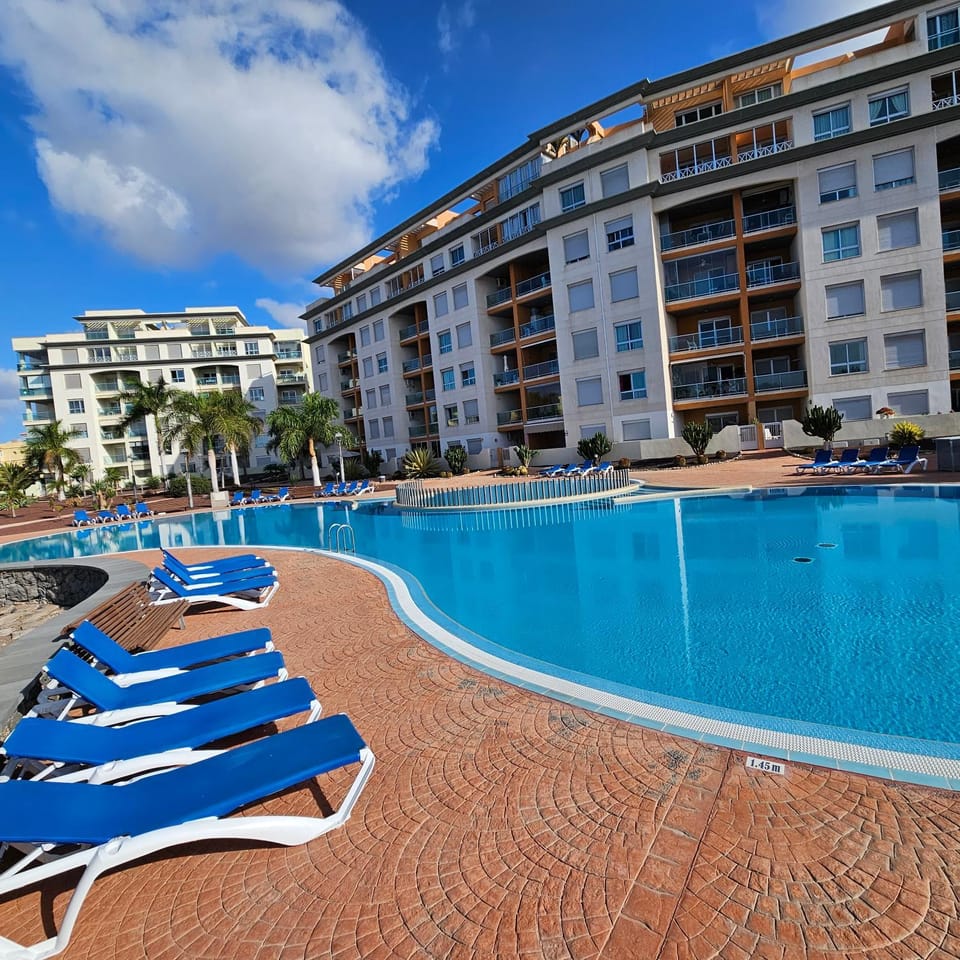 Property building, Pool view, Swimming pool, sunbed