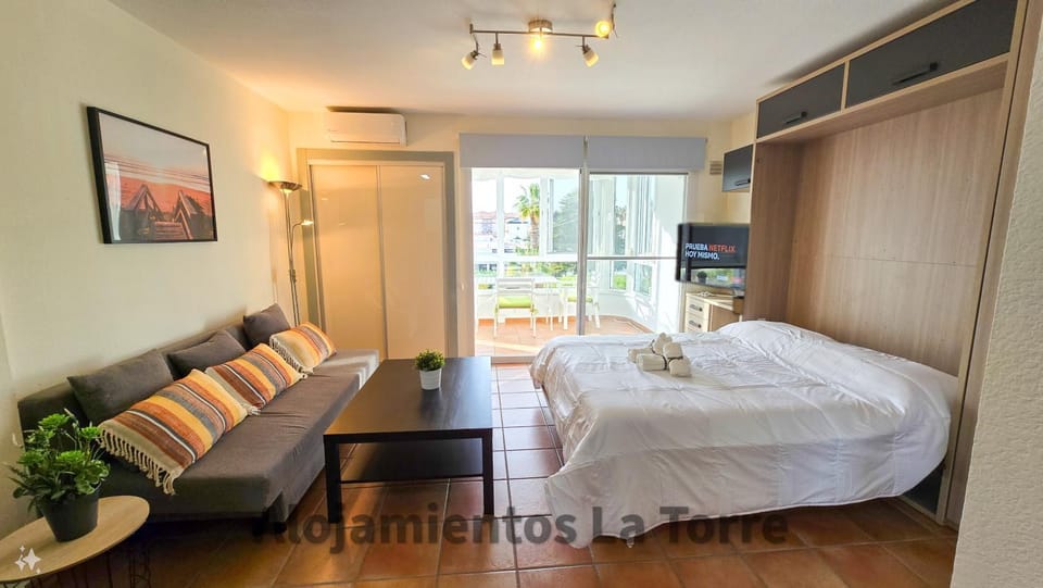 Bed, TV and multimedia, Living room, Photo of the whole room, towels, wardrobe, air conditioner