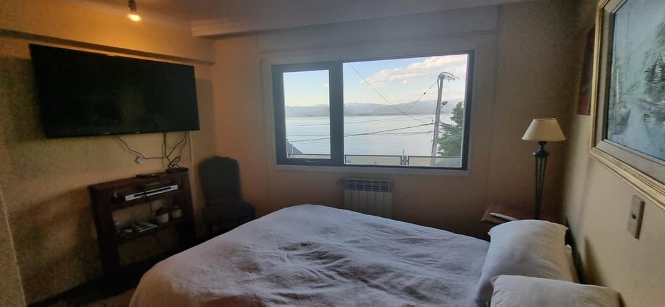 Bed, Natural landscape, TV and multimedia, Bedroom, Lake view