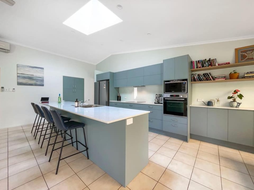 Kitchen or kitchenette, dishwasher, oven, stove