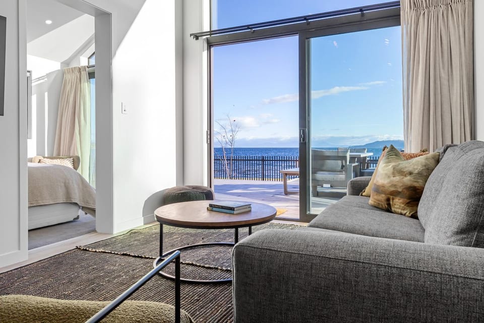 View (from property/room), Balcony/Terrace, Living room, Seating area, Lake view, Mountain view