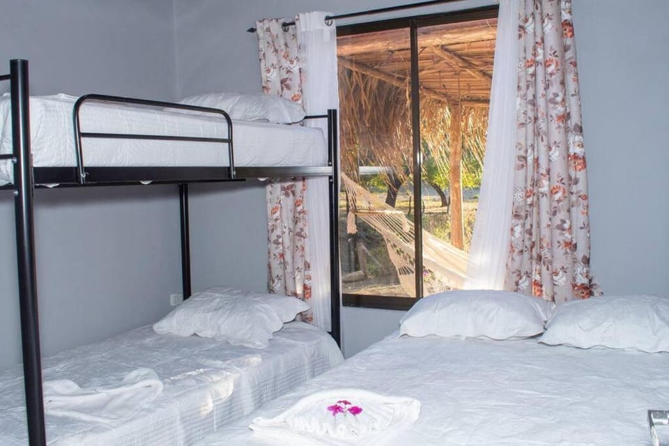 Bed, Photo of the whole room, Bedroom, bunk bed, towels, air conditioner