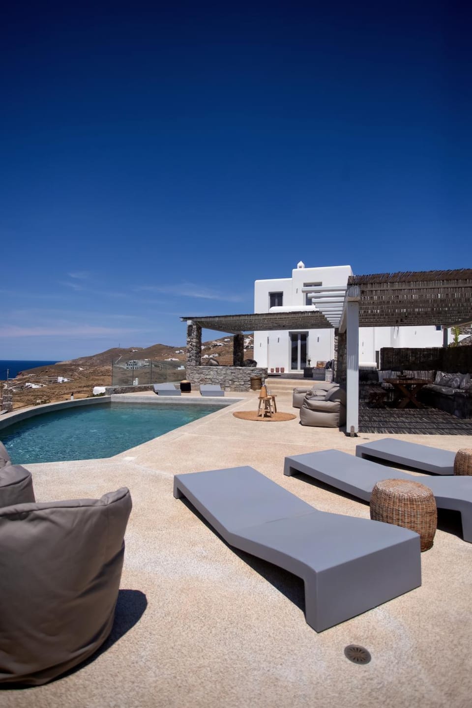 Property building, Seating area, Sea view, Swimming pool, sunbed