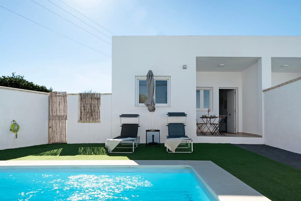 Property building, Living room, Swimming pool