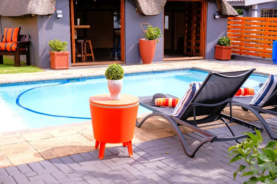 Patio, Pool view, Swimming pool, sunbed