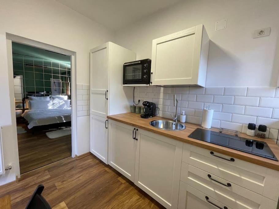 Kitchen or kitchenette, oven