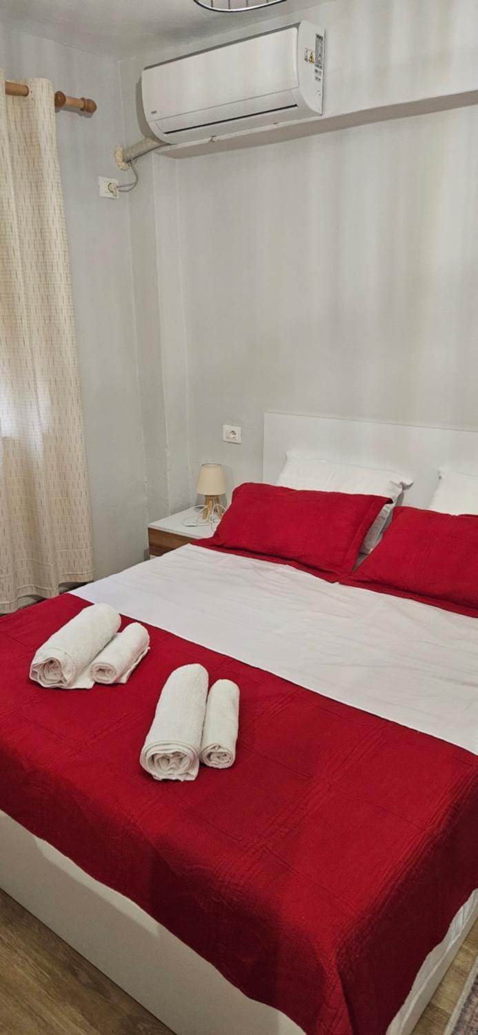Bed, Photo of the whole room, Bedroom, towels, air conditioner