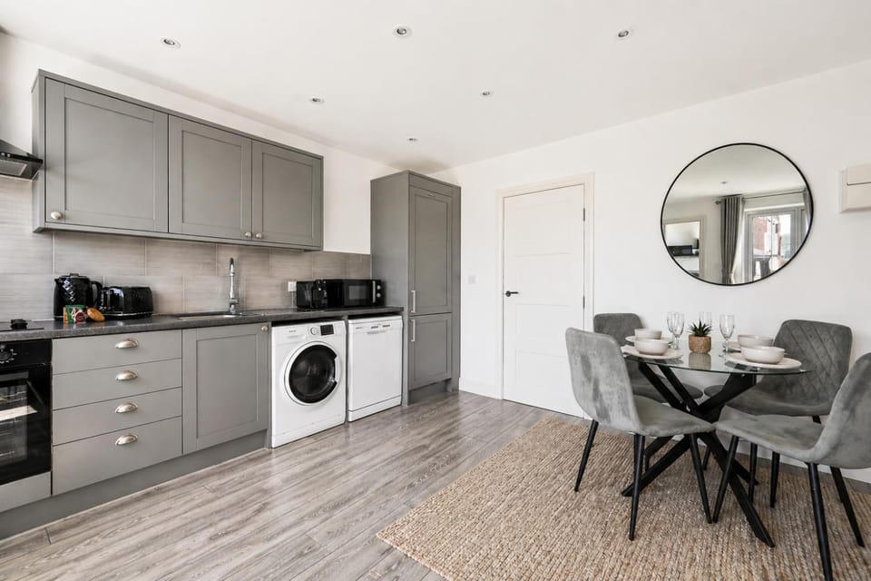 Living room, Seating area, Dining area, dishwasher, oven, stove, washing machine