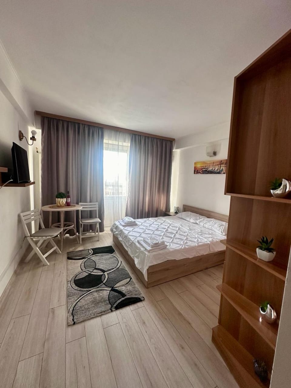 Bed, TV and multimedia, Living room, Photo of the whole room, Seating area, Bedroom, hair dresser, wardrobe