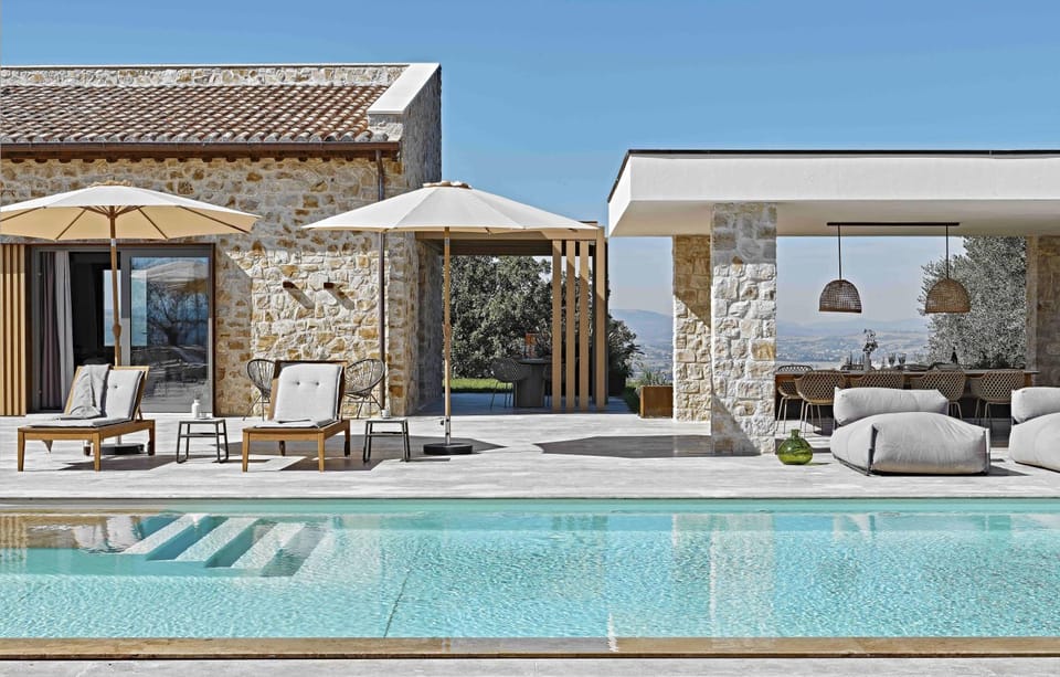 Property building, Patio, Pool view, Swimming pool, sunbed