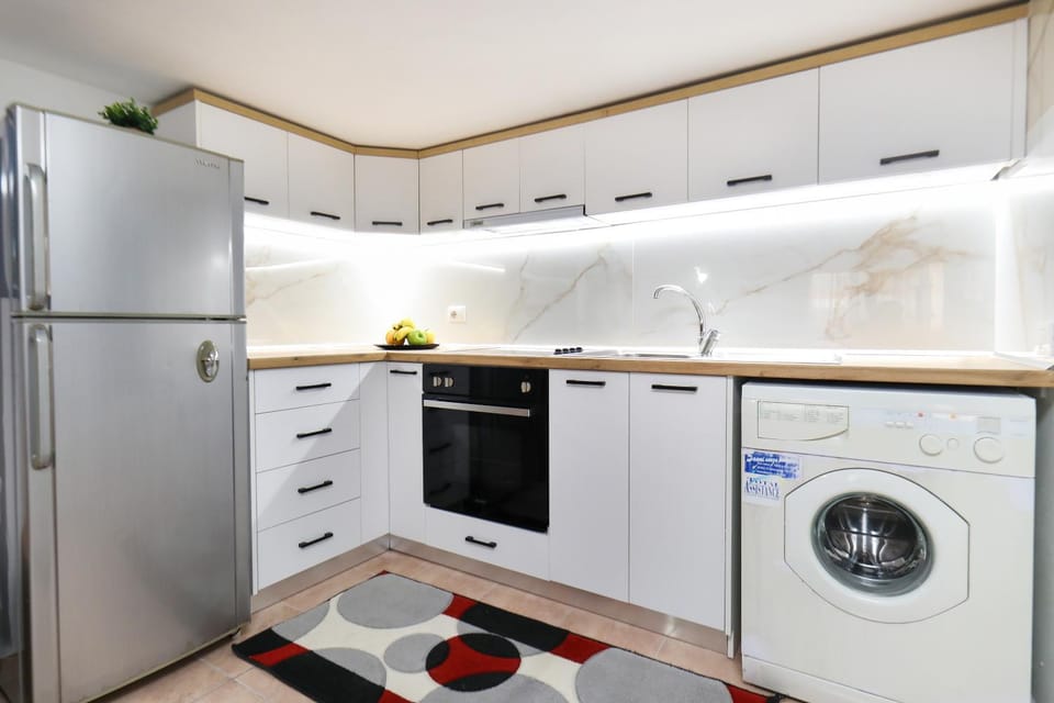 Kitchen or kitchenette, washing machine