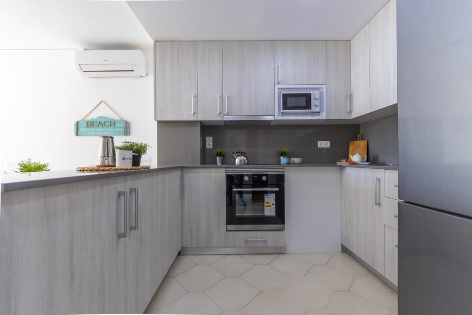Kitchen or kitchenette, oven, stove