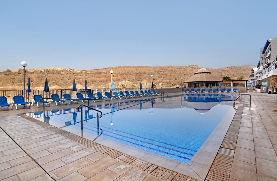 Property building, Living room, Swimming pool