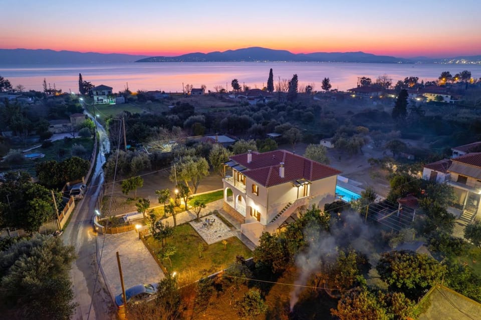 Property building, Neighbourhood, Natural landscape, Sea view, Sunset