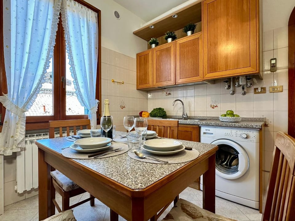 Kitchen or kitchenette, Dining area, stove, washing machine