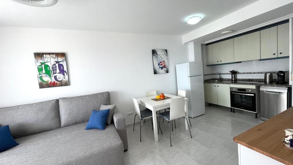 Kitchen or kitchenette, Living room, Seating area, Dining area, dishwasher, oven, stove, toaster