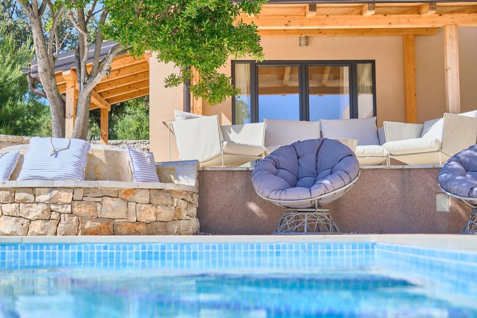 Patio, Day, Seating area, Pool view, sunbed