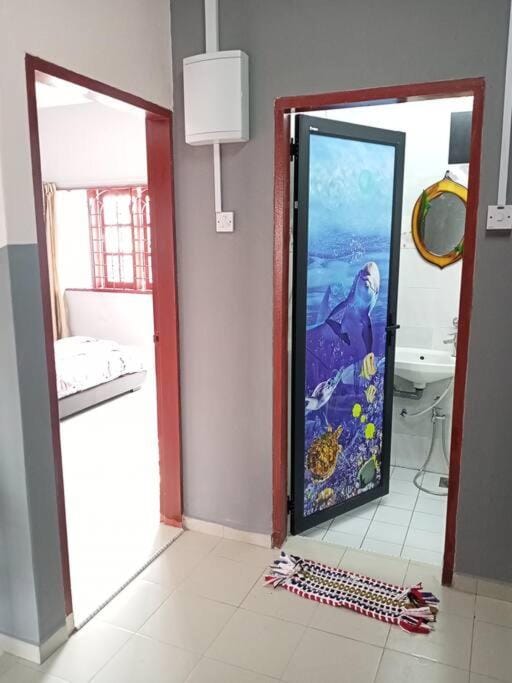 double storey cosy homestay pengkalan balak fully aircon House in Malaysia